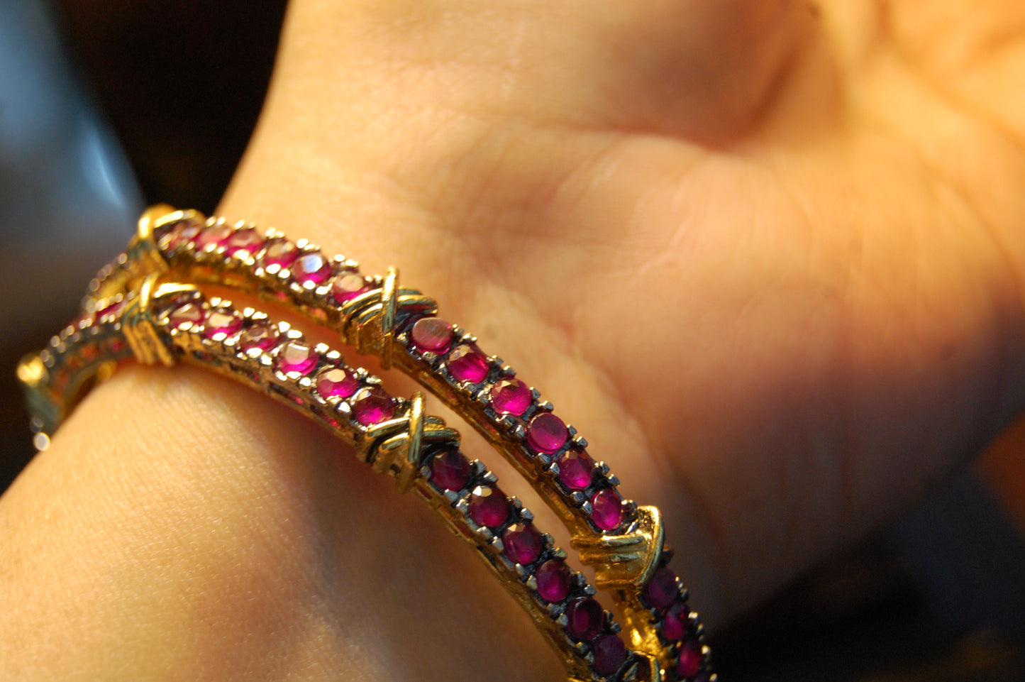 PAIR OF RUBY RED BANGLES (UNOPENABLE)