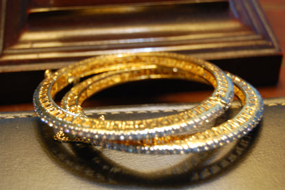 PAIR OF OPENABLE ZIRCON BANGLES