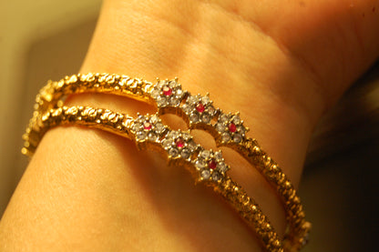 PAIR OF ELEGANT FLORAL RED & ZIRCON BANGLE