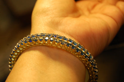 PAIR OF ELEGANT SAPPHIRE BLUE BANGLES