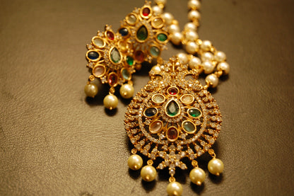 INDIAN MULTI JEWELLED PENDENT IN PEARL STRING