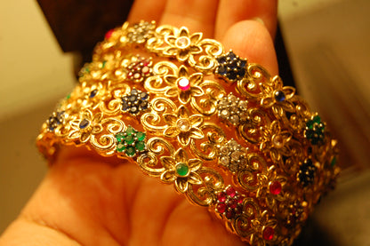 PAIR OF MULTI STONE BANGLES