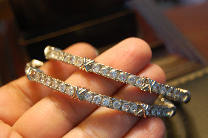 PAIR OF ZIRCON BANGLES (UNOPENABLE)