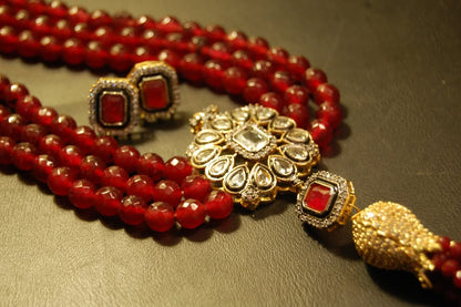 RUBY RED LONG MALA WITH TUSSEL