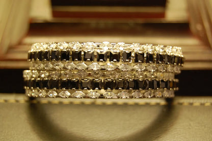 PAIR OF BLACK & ZIRCON BANGLES IN SILVER BASE