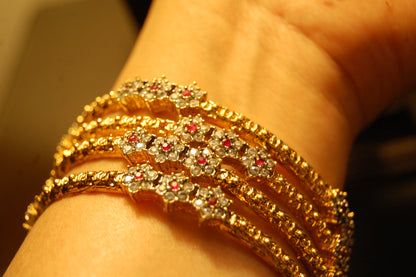 PAIR OF ELEGANT FLORAL RED & ZIRCON BANGLE