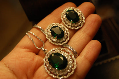 EMERALD GREEN PENDENT SET IN ZIRCONS