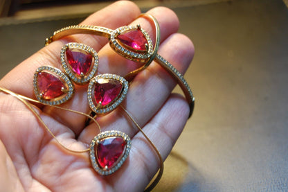 PENDENT SET IN REDISH PINK