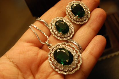 EMERALD GREEN PENDENT SET IN ZIRCONS