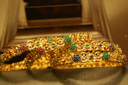 PAIR OF MULTI STONE BANGLES