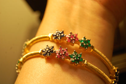 PAIR OF ELEGANT MULTI STONE BANGLES