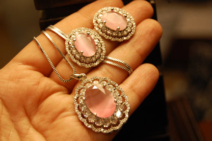 PINK PENDENT SET IN ZIRCONS