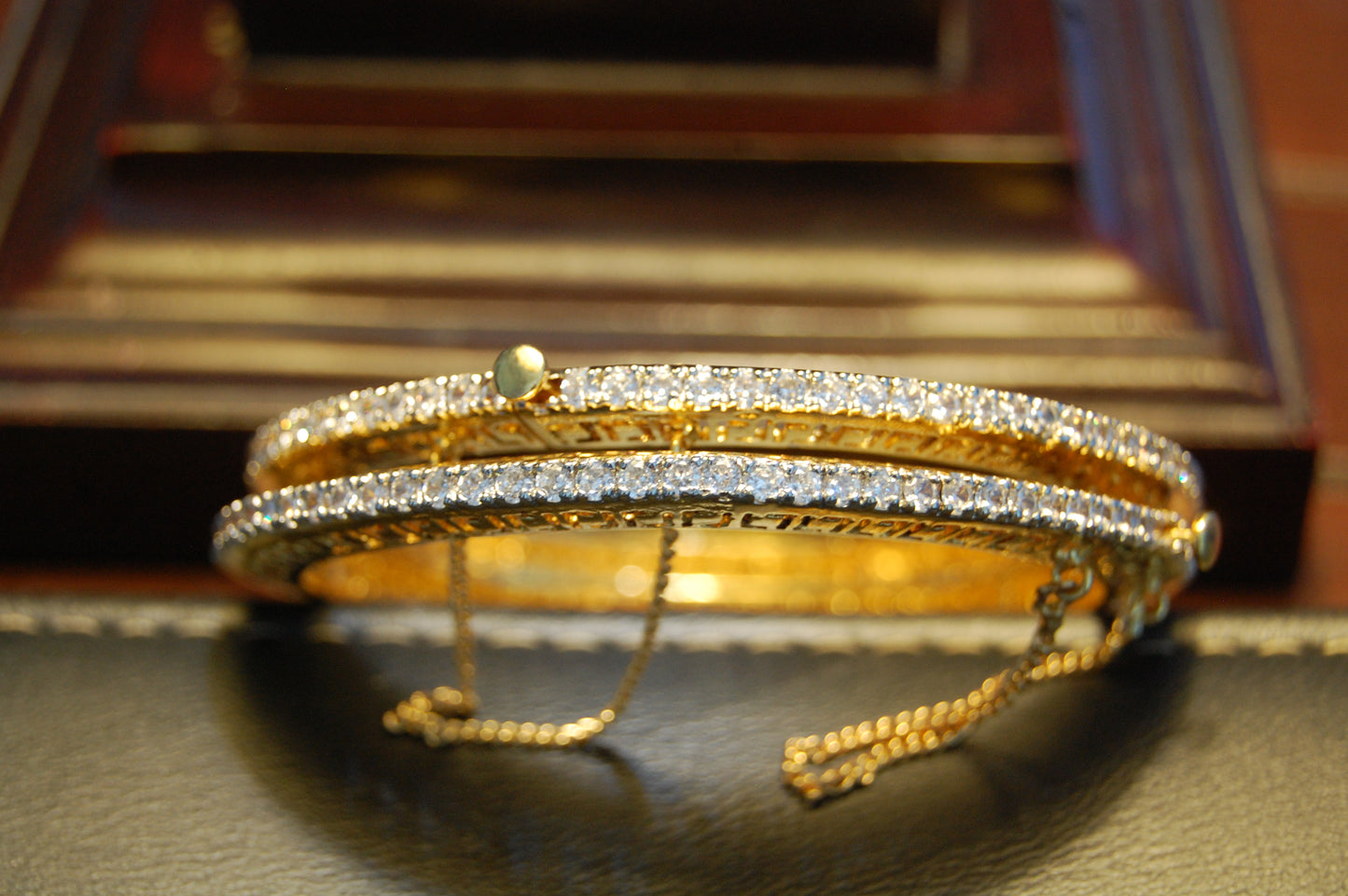PAIR OF OPENABLE ZIRCON BANGLES