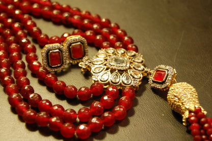 RUBY RED LONG MALA WITH TUSSEL