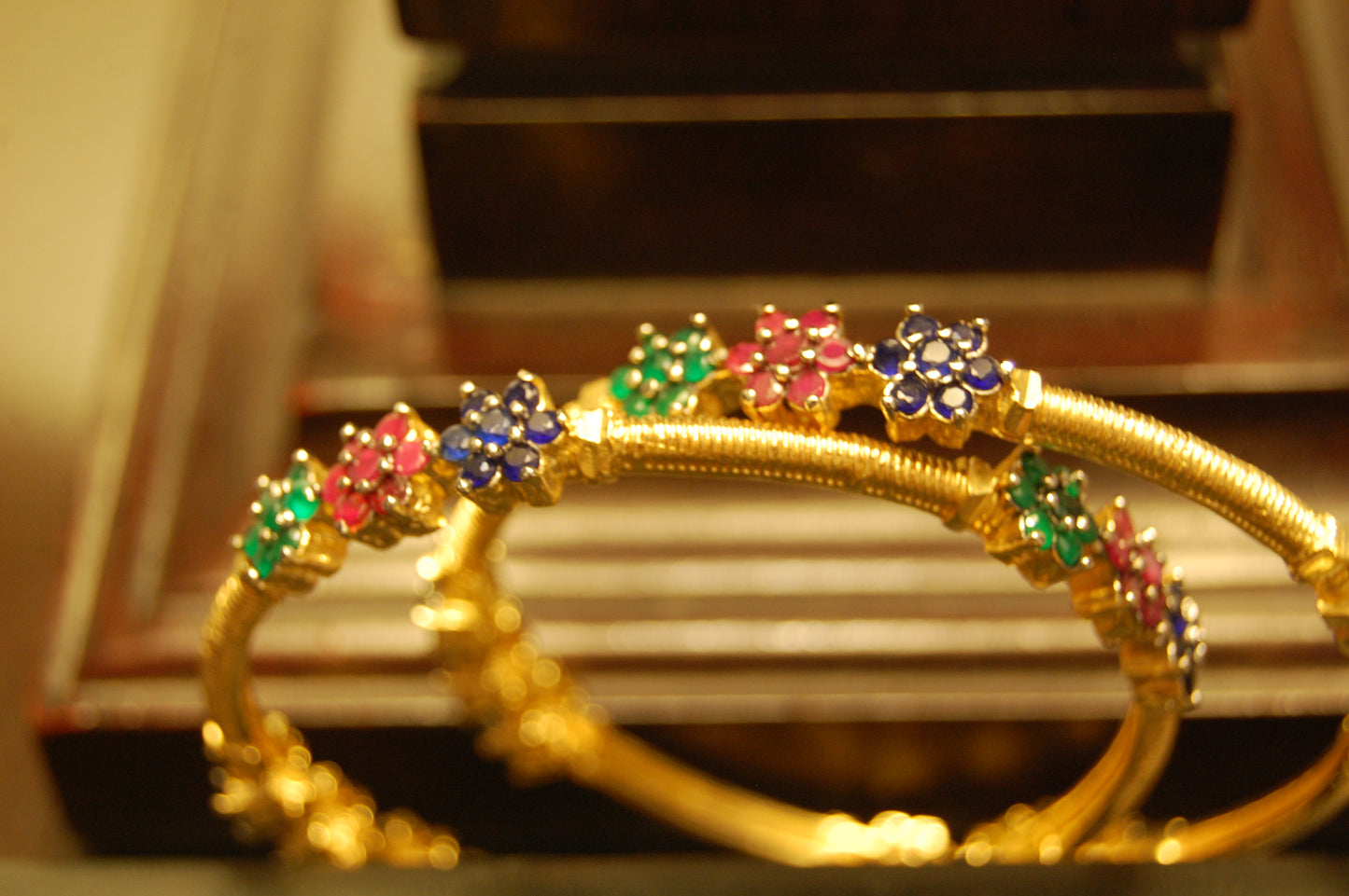 PAIR OF ELEGANT MULTI STONE BANGLES