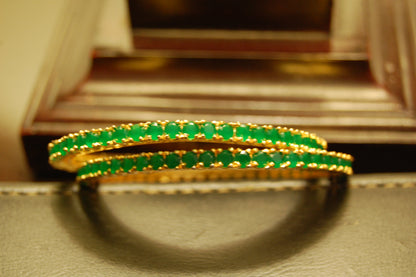 PAIR OF ELEGANT ZIRCON BANGLES