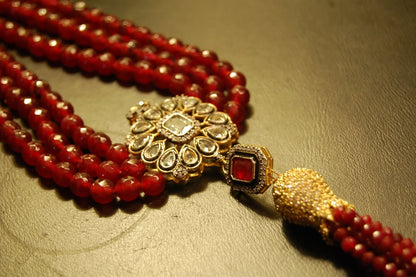 RUBY RED LONG MALA WITH TUSSEL