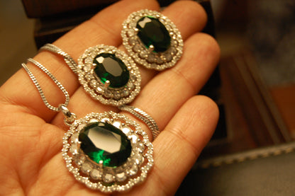 EMERALD GREEN PENDENT SET IN ZIRCONS