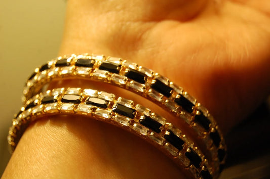 PAIR OF BLACK & ZIRCON BANGLES IN GOLDEN BASE