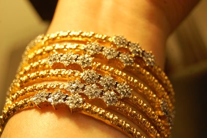 PAIR OF ELEGANT FLORAL ZIRCON BANGLE