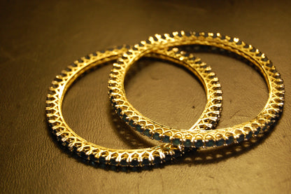 PAIR OF ELEGANT SAPPHIRE BLUE BANGLES