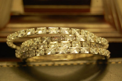 SET OF 4 ZIRCON BANGLES IN  SILVER BASE