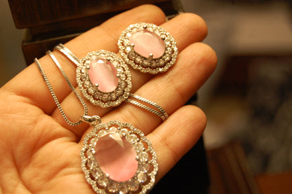 PINK PENDENT SET IN ZIRCONS