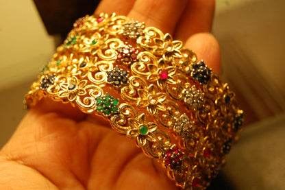 PAIR OF MULTI STONE BANGLES