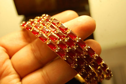SET OF 4 RED & ZIRCON BANGLES IN GOLDEN BASE