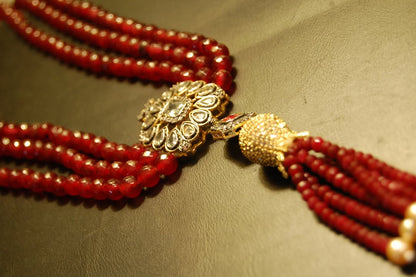RUBY RED LONG MALA WITH TUSSEL
