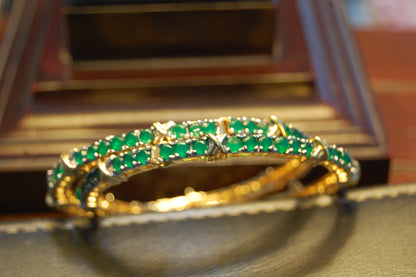 PAIR OF OPENABLE GREEN BANGLES