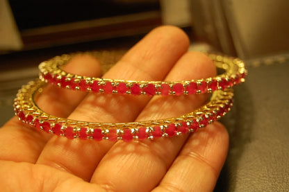 PAIR OF ELEGANT RUBY RED  BANGLES