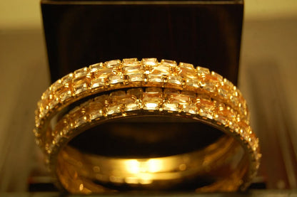 PAIR OF CHAMPAGNE & ZIRCON BANGLES IN GOLDEN BASE