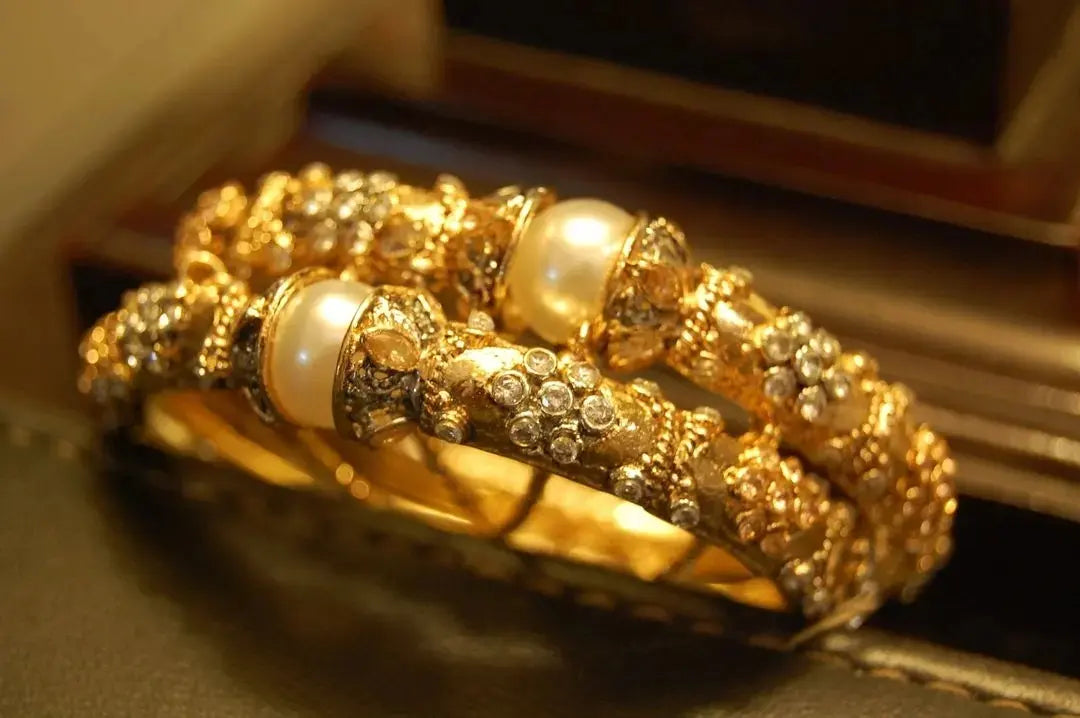 PAIR OF ZIRCON & PEARL BANGLES