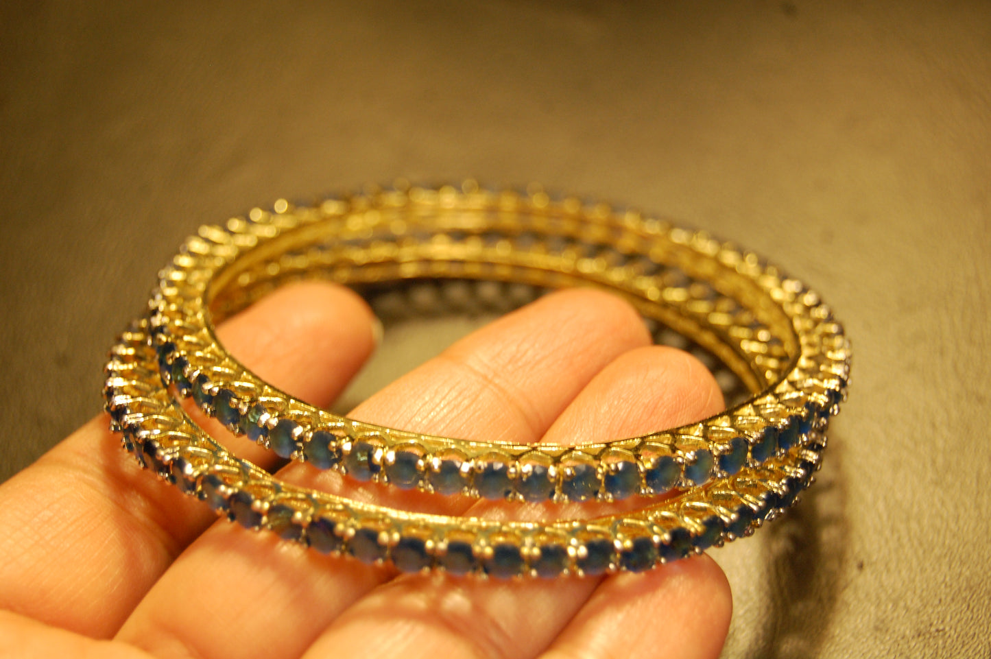 PAIR OF ELEGANT SAPPHIRE BLUE BANGLES