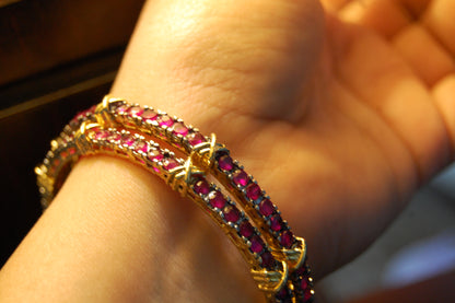 PAIR OF RUBY RED BANGLES (UNOPENABLE)