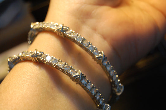 PAIR OF ZIRCON BANGLES (UNOPENABLE)
