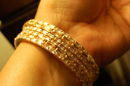 PAIR OF CHAMPAGNE & ZIRCON BANGLES IN GOLDEN BASE
