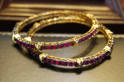 PAIR OF RUBY RED BANGLES (UNOPENABLE)