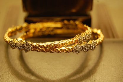 PAIR OF ELEGANT FLORAL ZIRCON BANGLE