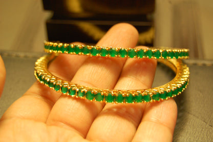 PAIR OF ELEGANT ZIRCON BANGLES