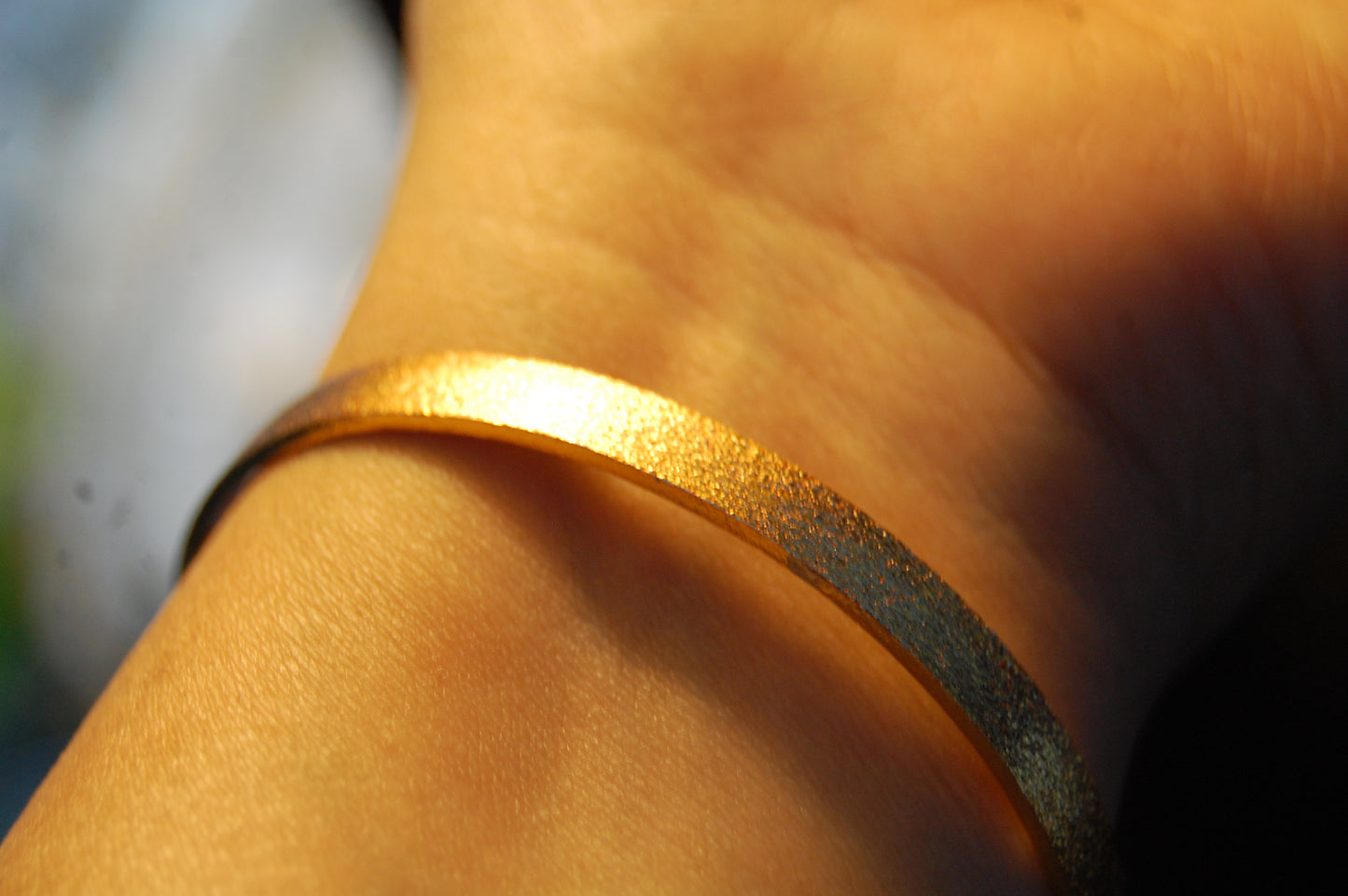 PAIR OF ELEGANT DULL GOLD BANGLES
