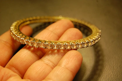 PAIR OF ELEGANT ZIRCON BANGLES