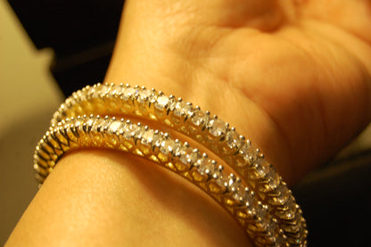 PAIR OF ELEGANT ZIRCON BANGLES