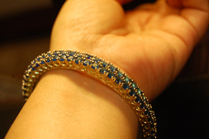 PAIR OF ELEGANT SAPPHIRE BLUE BANGLES