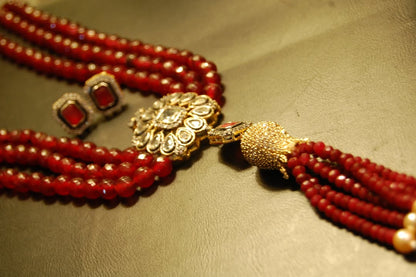 RUBY RED LONG MALA WITH TUSSEL