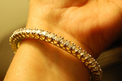 PAIR OF ELEGANT ZIRCON BANGLES