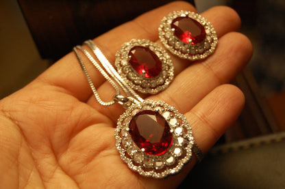 RED PENDENT SET IN ZIRCONS