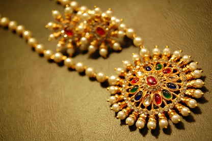 INDIAN MULTI JEWELLED PENDENT IN PEARL STRING