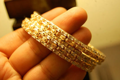 PAIR OF CHAMPAGNE & ZIRCON BANGLES IN GOLDEN BASE